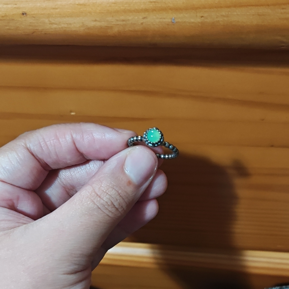 Elegant Silver and Green Ring